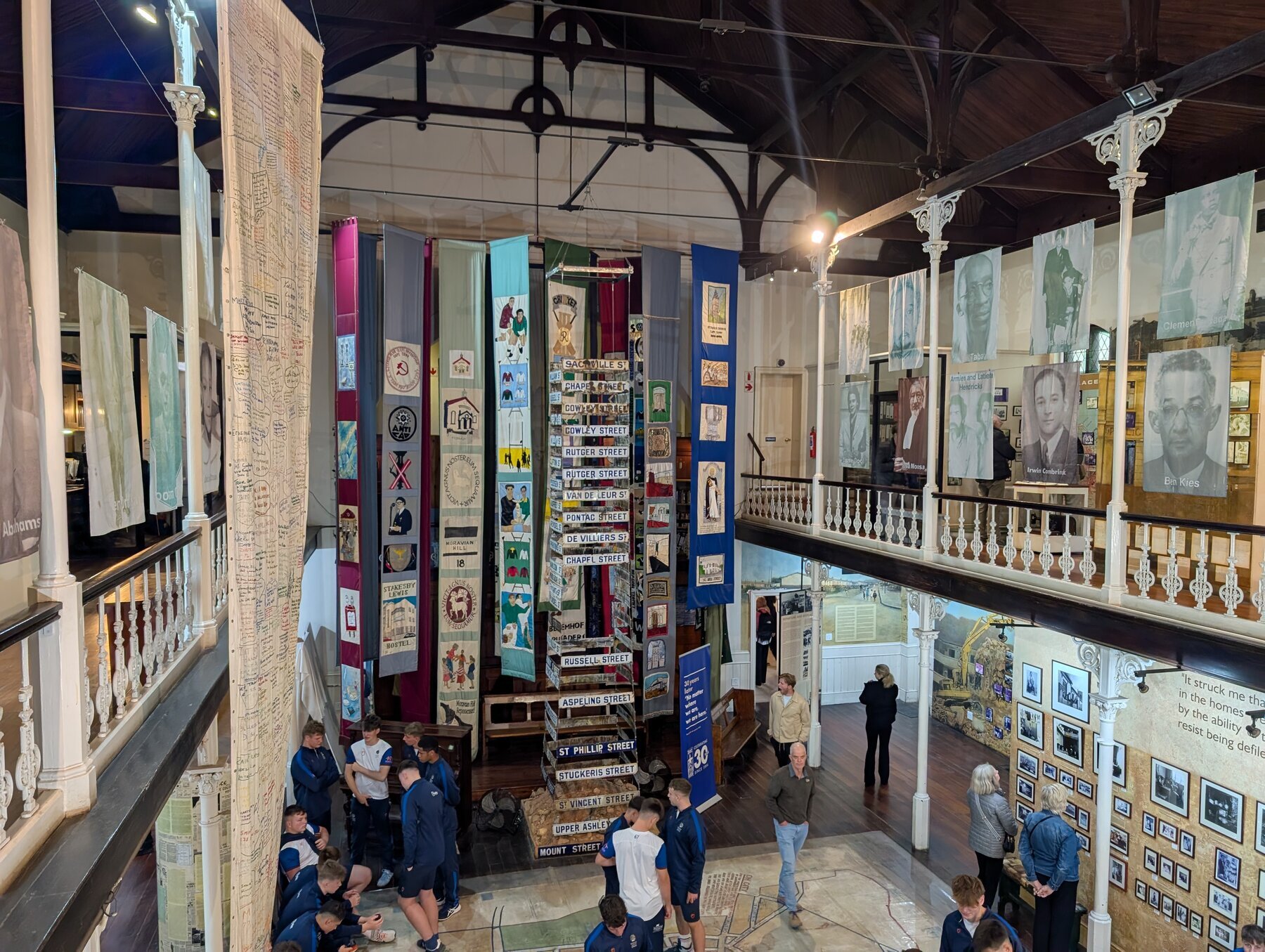 The District 6 Museum tells the harrowing story of apartheid from the microcosm of a single neighborhood. The government decided in 1966 that this district of Cape Town should be designated whites-only, and forcibly removed 60,000 people from a thriving community. Our guide was the child of a couple who were amongst those dislocated. In the back of this main hall are street signs rescued from the neighborhood.