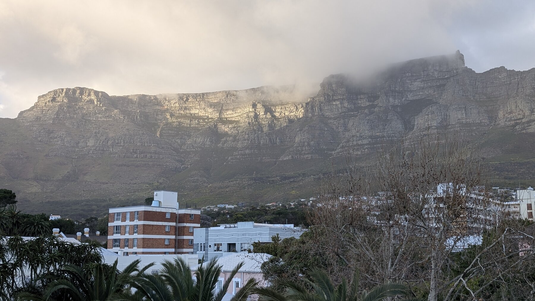 Table Mountain bathed in clouds from Mt Nelson hotel