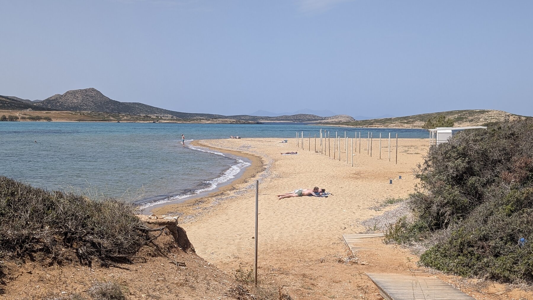 Plage Ag Georgios in early May is pleasant but not spectacular