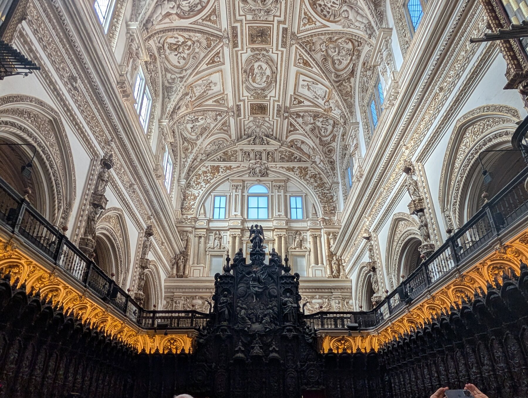 The 18th-century choir, built from Caribbean wood, contrasts gorgeously with the roof.