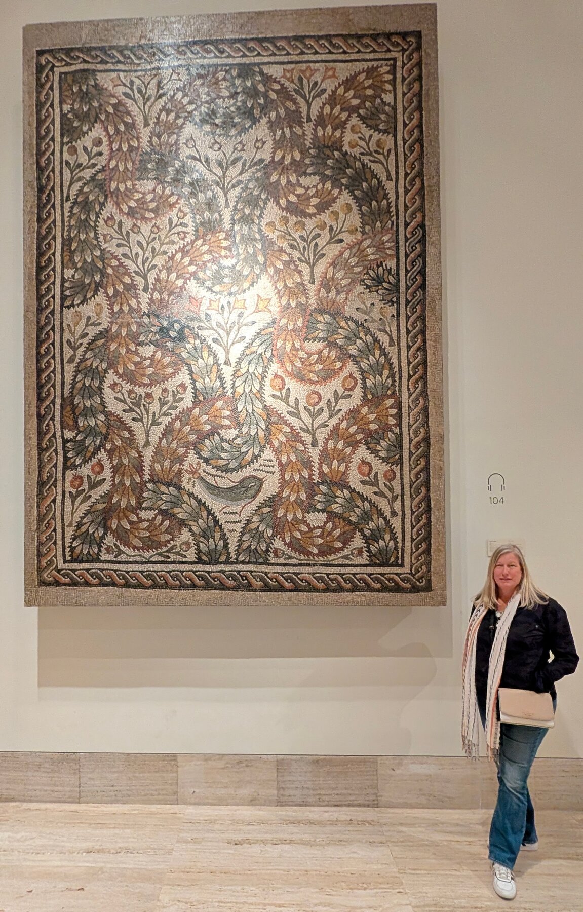 What looks like a tapestry at first is actually a Roman floor -- patterned, bordered, and detailed enough that you forget it was meant to be walked across.