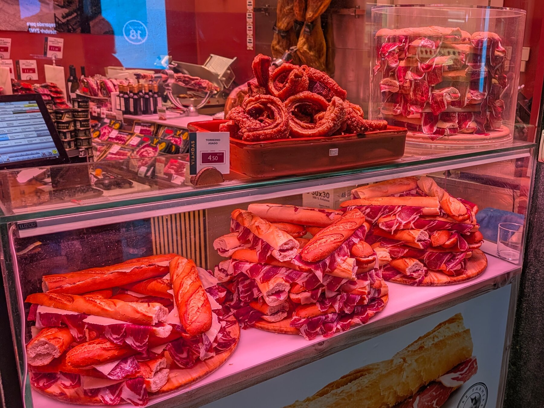 Malaga features a very busy shopping district, much of it with the usual generic high-end brands, but ... the Iberian Ham makes it look a bit more distinct.